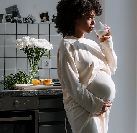 pregnant lady drinking water.png